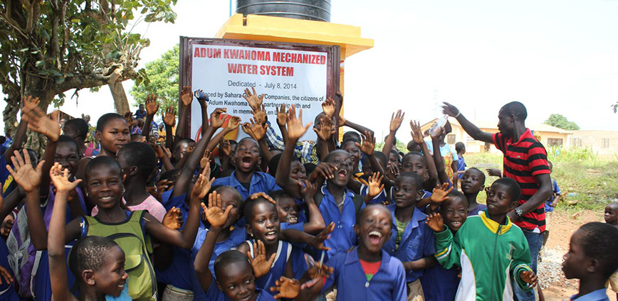 Kids rejoicing at the Adum Kwahoma Mechanized Water System in Ghana
